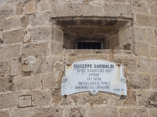 Plaque dedicated to Guiseppe Garibaldi at the Torre di Garibaldi, tower of the fortress, Alghero, Sardinia, Italy, Europe