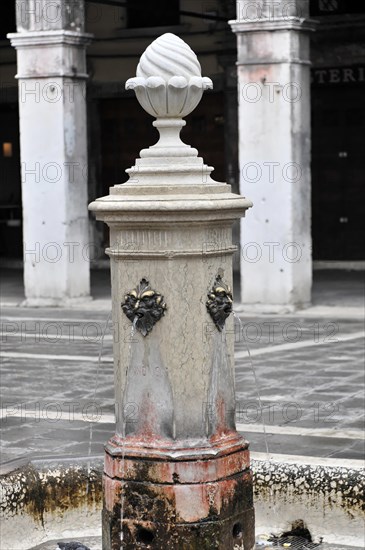 Rialto Market, shell fountain with running water in a square, Venice, Veneto, Italy, Europe