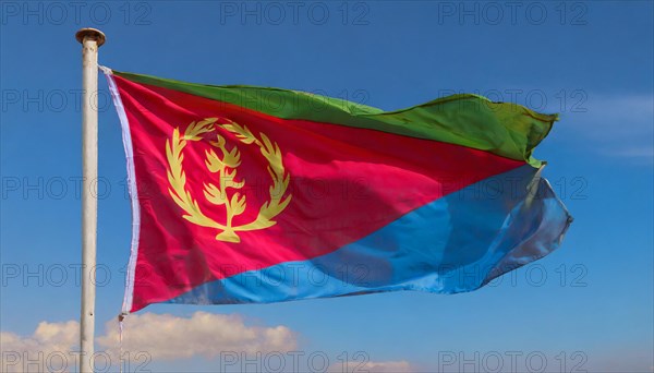 Flags, the national flag of Eritrea flutters in the wind