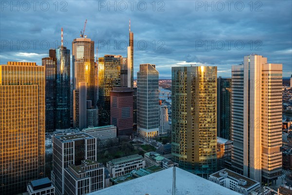 View of the skyline from a tower block in the evening. Fantastic view over a financial centre at sunset. City photo of Frankfurt am Main, Hesse Germany