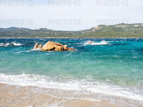 Rock formation in the sea, Spiaggia Capriccioli, Costa Smeralda, Sardinia, Italy, Europe