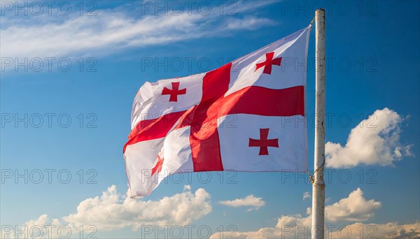 Flags, the national flag of Georgia flutters in the wind