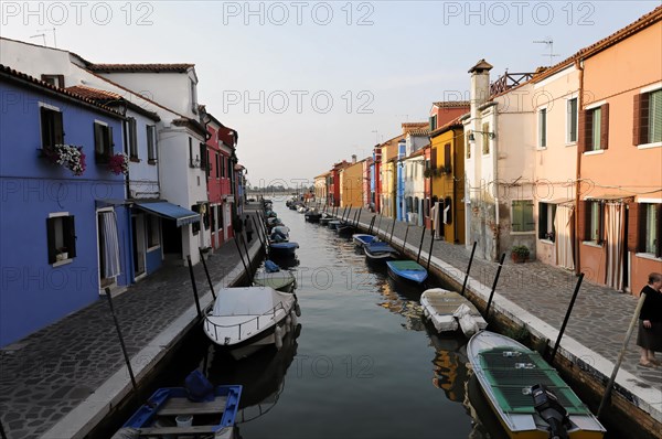 Colourful houses, Burano, Burano island, canal surrounded by colourful houses with boats and a bridge at dusk, Burano, Venice, Veneto, Italy, Europe