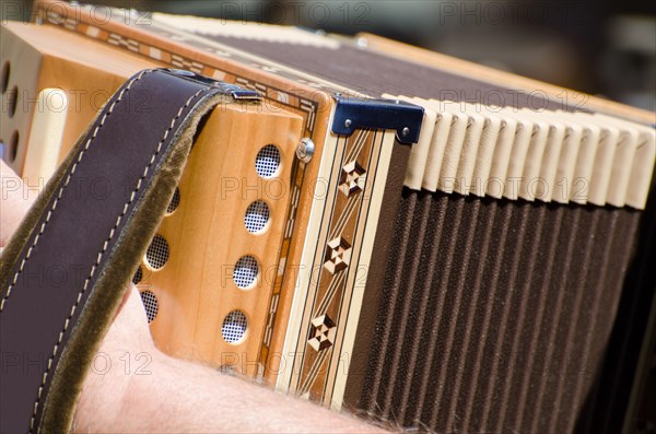 Man Playing on an Accordion