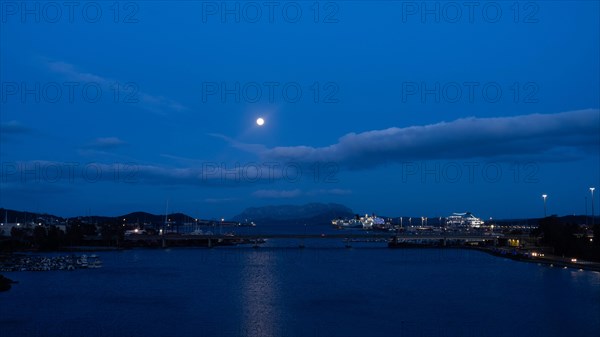 Full moon over the harbour of Olbia, Olbia, Sardinia, Italy, Europe