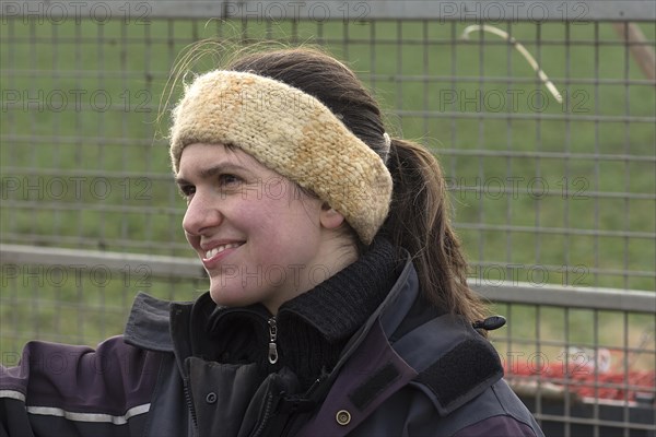 Portrait of a laughing young woman with a headband, Mecklenburg-Vorpommern, Germany, Europe