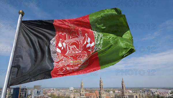 Flag, the national flag of Afghanistan flutters in the wind