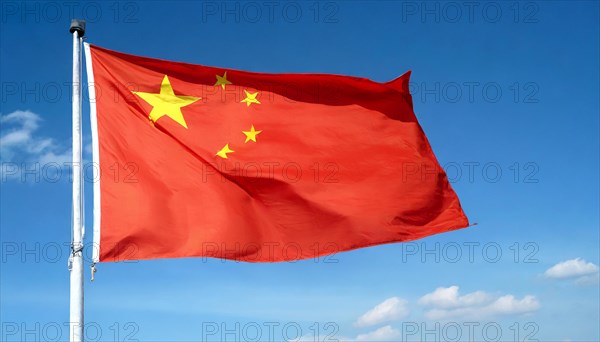 Flag, the national flag of China flutters in the wind