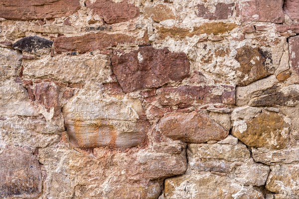 Wall made of sandstone, natural stone, quarry stone and mortar, background picture, old town, Ortenberg, Vogelsberg, Wetterau, Hesse, Germany, Europe