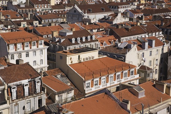 High angle view of buildings with traditional terracotta tiled rooftops in old Lisbon from Santa Justa elevator observation platform, Lisbon, Portugal, Europe