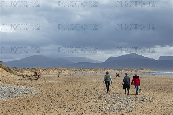 Beach, people, clouds, mountains, LLanddwyn Bay, Newborough, Isle of Anglesey, Wales, Great Britain