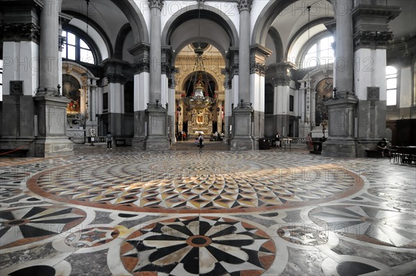 Interior view of the church of Santa Maria della Salute, Venice, wide-angle view of a church interior with archways and marble floor, Venice, Veneto, Italy, Europe