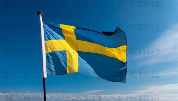 Flags, the national flag of Sweden, fluttering in the wind