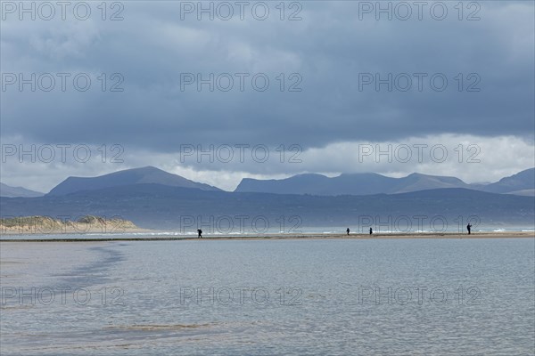 Beach, people, clouds, mountains, LLanddwyn Bay, Newborough, Isle of Anglesey, Wales, Great Britain