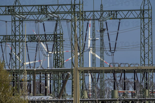 Stendal West substation with wind turbines in the background near Luederitz, Stendal, Saxony-Anhalt, Germany, Europe