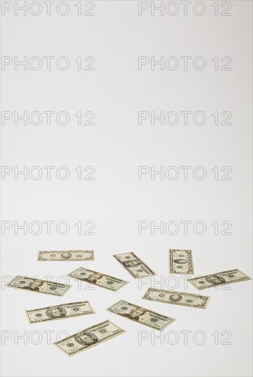 Close-up of US twenty dollar bills with portrait of Andrew Jackson on white background, Studio Composition, Quebec, Canada, North America