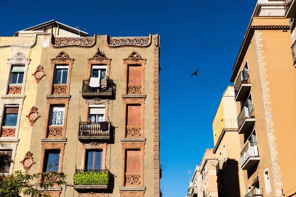 Street and old houses in Barcelonata, an old neighbourhood at the port of Barcelona, Spain, Europe