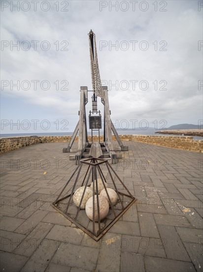 Old siege engine, fortress wall of Alghero, Sardinia, Italy, Europe