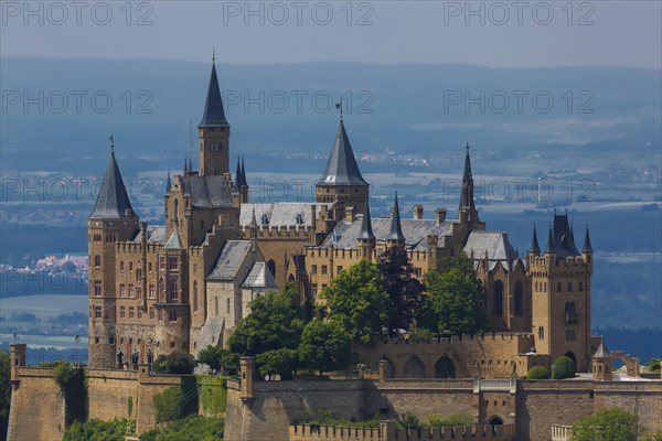 Hohenzollern Castle, ancestral castle of the princely dynasty and former ruling Prussian royal and German imperial house of Hohenzollern, summit castle, historical building by the Berlin architect Friedrich August Stueler, architecture, neo-Gothic, castle building, aristocratic residence, south view from the Zellerhorn, Bisingen, Zollernalbkreis, Baden-Wuerttemberg, Germany, Europe
