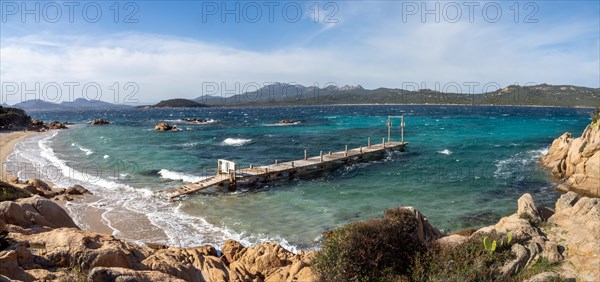 Rock formations, jetty leading into the sea, panoramic shot, Capriccioli beach, Costa Smeralda, Sardinia, Italy, Europe