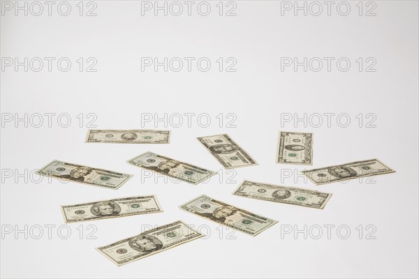 Close-up of US twenty dollar bills with portrait of Andrew Jackson on white background, Studio Composition, Quebec, Canada, North America