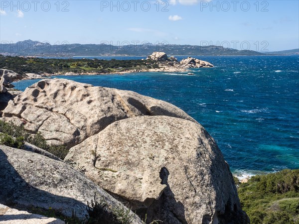 Typical granite rock formations in front of a bay, Baja Sardinia, Costa Smeralda, Sardinia, Italy, Europe