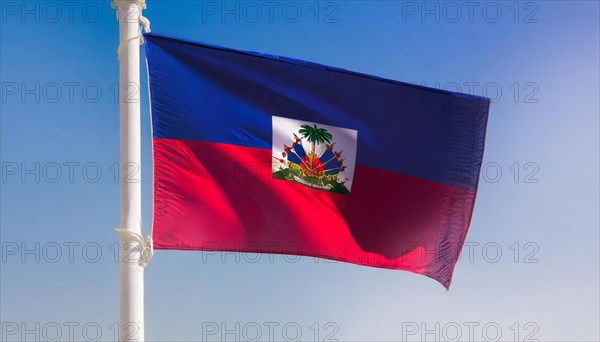 Flags, the national flag of Haiti flutters in the wind