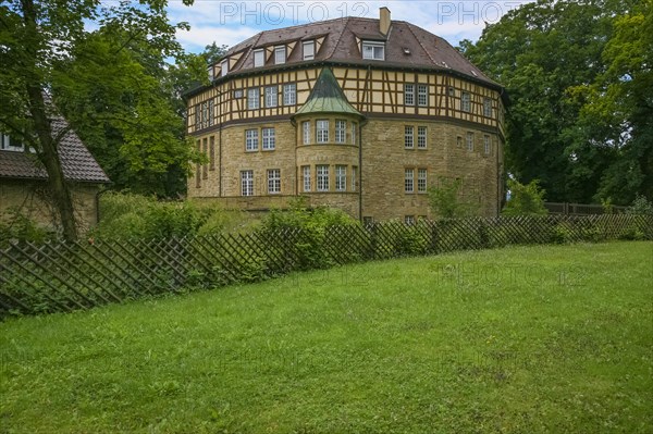 Moated castle Sachsenheim, castle Grosssachsenheim, former moated castle, architecture, historic building from the 15th century, half-timbered, meadow, lawn, facade, windows, masonry, Sachsenheim, district of Ludwigsburg, Baden-Wuerttemberg, Germany, Europe