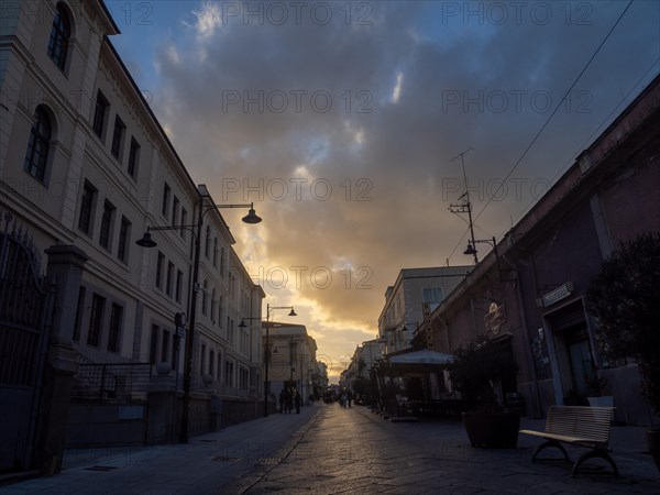 Dramatic clouds over a street, pedestrian zone, Olbia, Sardinia, Italy, Europe