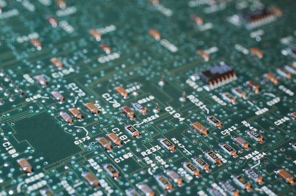 Close-up of green lighted electronic computer circuit board, Studio Composition, Quebec, Canada, North America