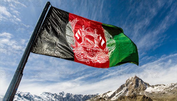 Flag, the national flag of Afghanistan flutters in the wind