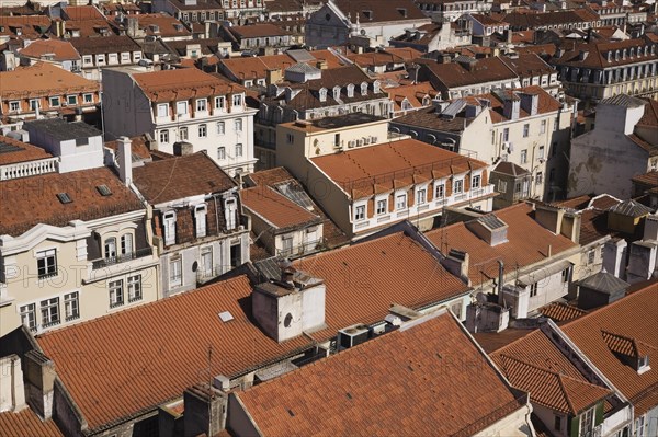 High angle view of buildings with traditional terracotta tiled rooftops in old Lisbon from Santa Justa elevator observation platform, Lisbon, Portugal, Europe