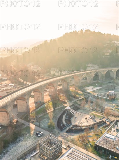 Bridge spanning a town during the golden hour with soft sunlight, sunrise, Nagold, Black Forest, Germany, Europe