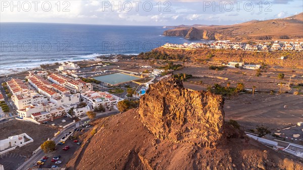 Aerial view of the town of Agaete and its Puerto de las Nieves at summer sunset in Gran Canaria. Spain