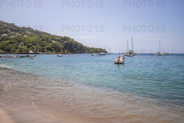 A beach in the Caribbean on the Atlantic coast in Deshaies, Guadeloupe, French Antilles, North America