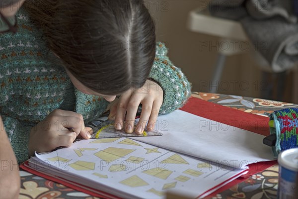 Girl, 10 years old, doing schoolwork, Mecklenburg-Western Pomerania, Germany, Europe