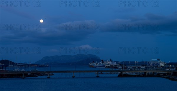 Full moon over the harbour of Olbia, Olbia, Sardinia, Italy, Europe