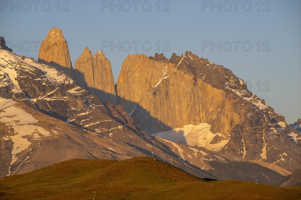 Andes mountain range, morning light, Torres del Paine National Park, Parque Nacional Torres del Paine, Cordillera del Paine, blue sky towers, Region de Magallanes y de la Antartica Chilena, Ultima Esperanza province, UNESCO biosphere reserve, Patagonia, end of the world, Chile, South America