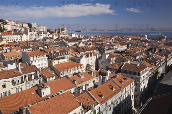 High angle view of buildings with traditional terracotta tiled rooftops in old Lisbon from Santa Justa elevator observation platform, Lisbon, Portugal, Europe