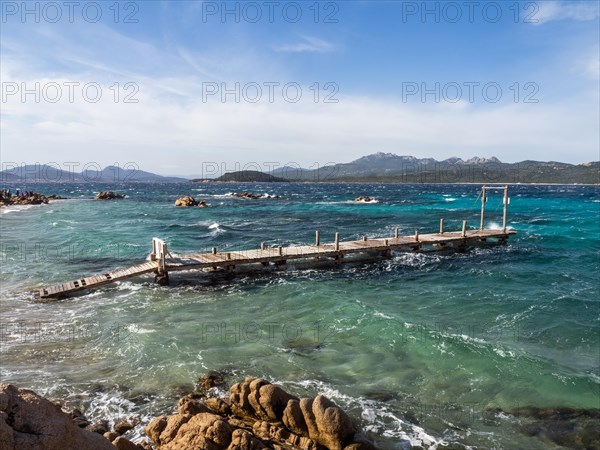 Rock formations, jetty leading into the sea, Capriccioli beach, Costa Smeralda, Sardinia, Italy, Europe