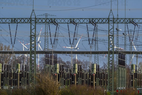 Stendal West substation with wind turbines in the background near Luederitz, Stendal, Saxony-Anhalt, Germany, Europe