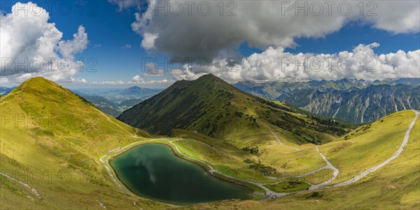 Riezler Alpsee, an artificial lake, snow pond, feeds the snow cannons that provide complete snow cover for the Fellhorn and Kanzelwand cable car slopes, Fellhorn behind, 2038m, Allgaeu Alps, Bavaria, Germany, Europe