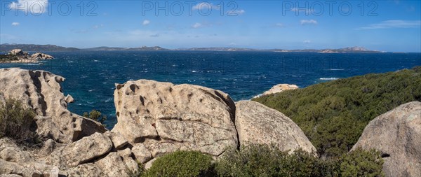 Typical granite rock formations in front of a bay, Baja Sardinia, Costa Smeralda, Sardinia, Italy, Europe