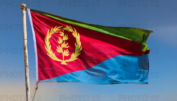 Flags, the national flag of Eritrea flutters in the wind