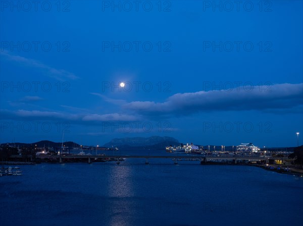 Full moon over the harbour of Olbia, Olbia, Sardinia, Italy, Europe