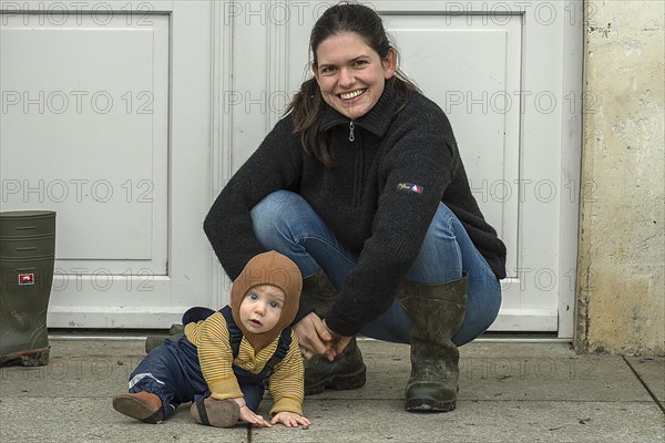 Laughing young mother with her son, 8 months, Mecklenburg-Vorpommern, Germany, Europe