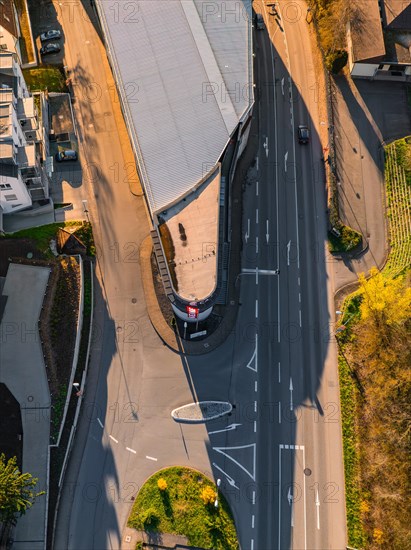 Bird's eye view of overpass and intersecting roads, with traffic and long shadows, Calw, Black Forest, Germany, Europe