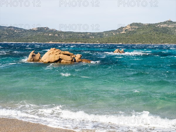 Rock formation in the sea, Spiaggia Capriccioli, Costa Smeralda, Sardinia, Italy, Europe