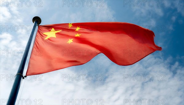 Flag, the national flag of China flutters in the wind