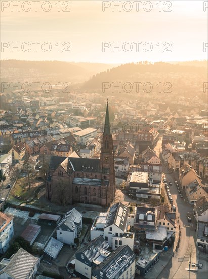 Evening sun bathes the town in golden light, church towers rise up, sunrise, Nagold, Black Forest, Germany, Europe